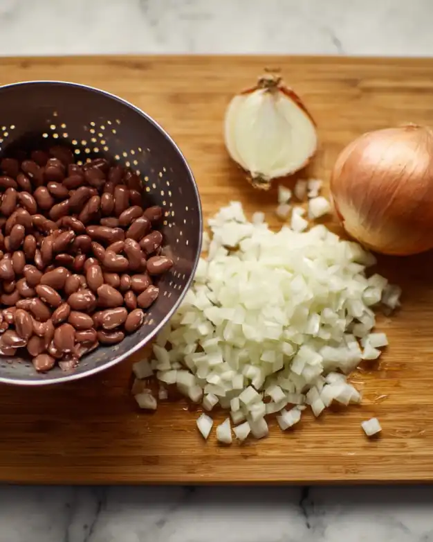 diced onion and drained black beans for one pot Mexicali black bean soup