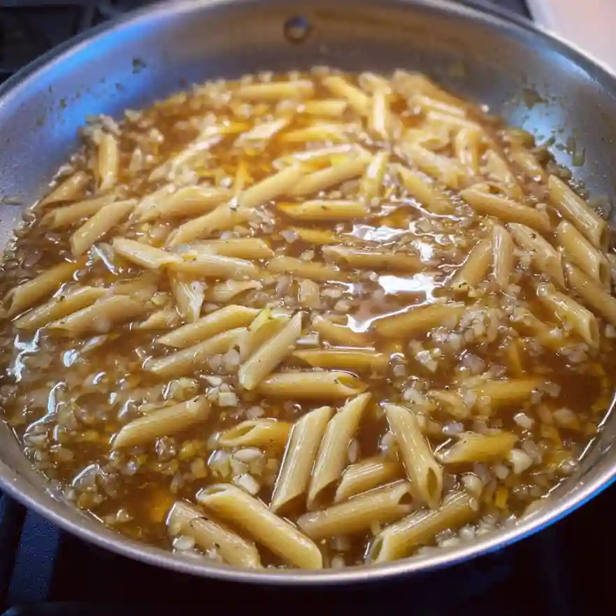 Cooking pasta in broth