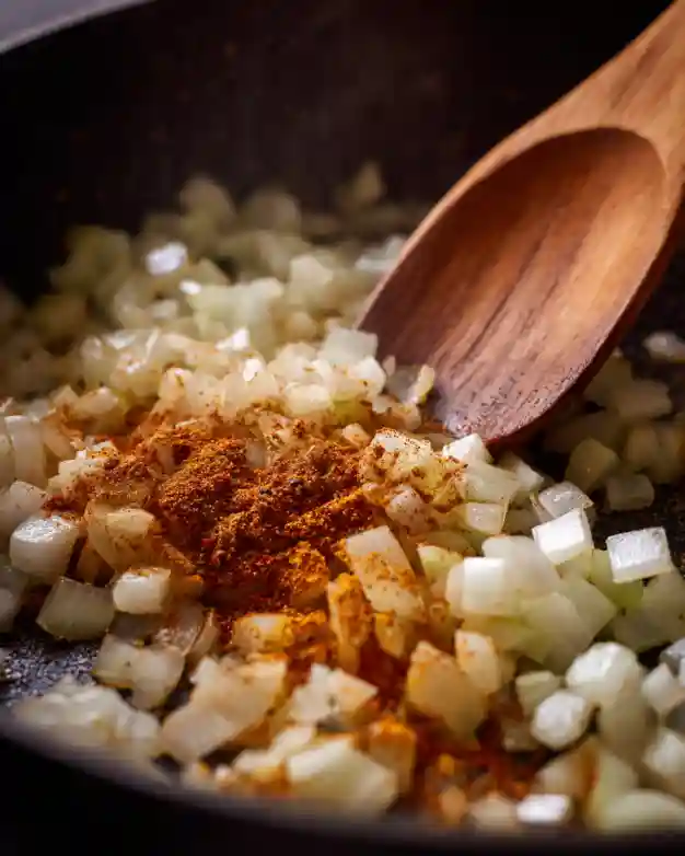 Sautéing onion and spices in one pot
