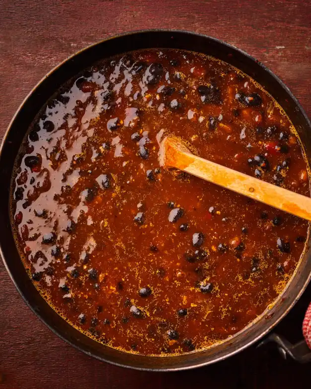 one pot Mexicali black bean soup simmering in large pot