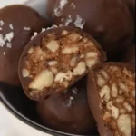 pecan pie balls no bake coated in chocolate with flaky salt