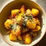 Crispy golden quick side dish roast potatoes with parmesan and parsley