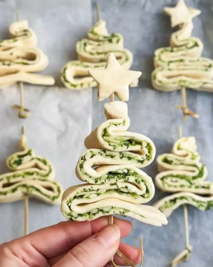 Christmas Puff Pastry Trees 3 Unbaked Christmas puff pastry trees shaped and skewered before baking